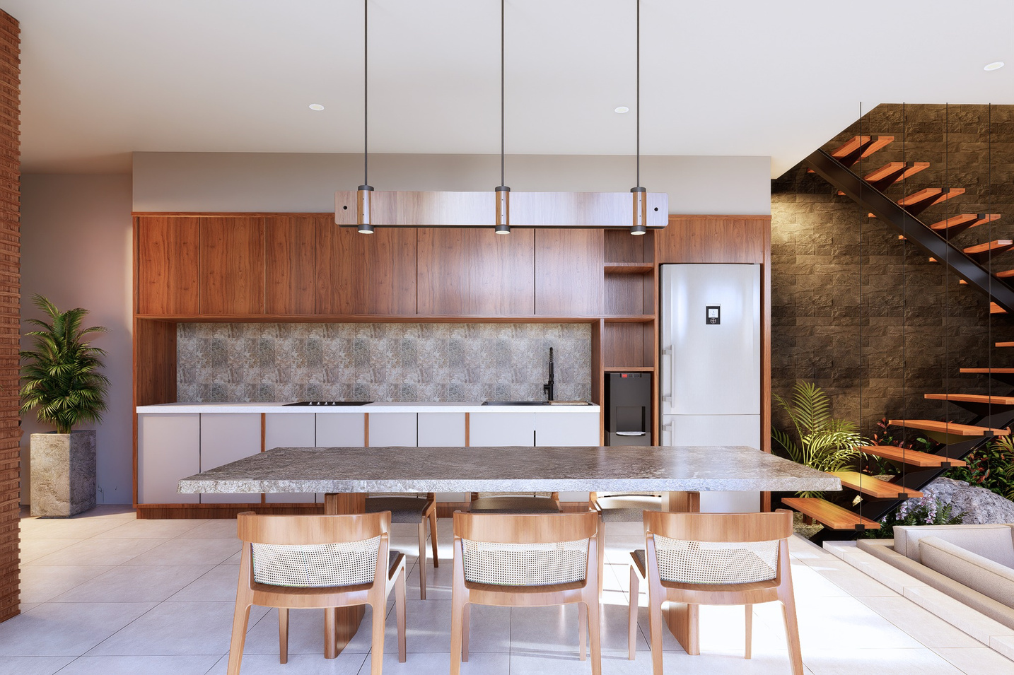 Kitchen with walnut cabinetry beside a staircase in stacked stone